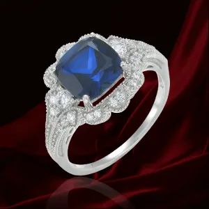 Blue Sapphire Ring with Scalloped Halo